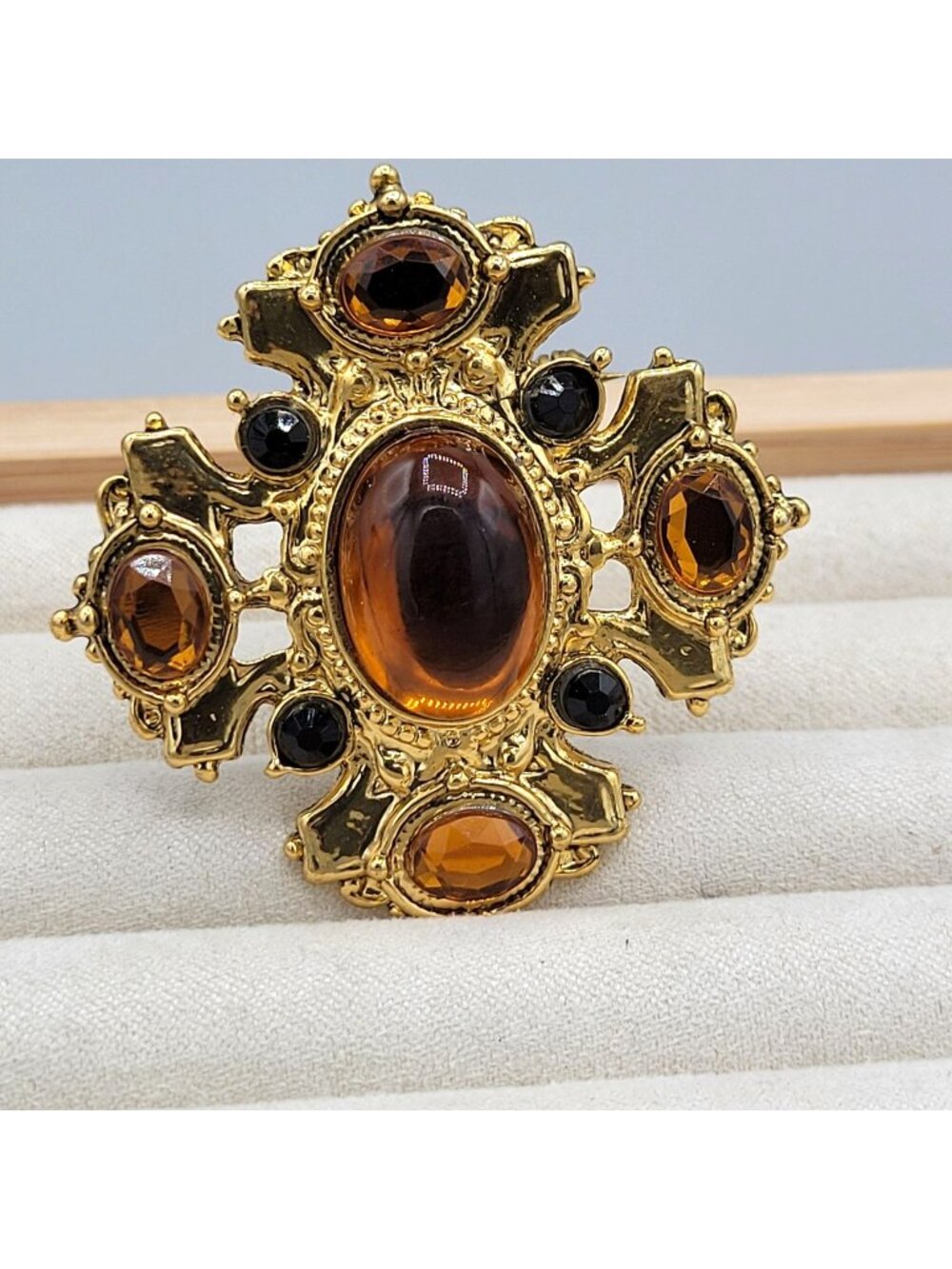 Vintage Golden Brooch With Ornate Scrollwork Amber Colored Stones Black Stones